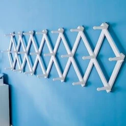 SKOLOO Accordion Wall Hanger, Modern Expandable Coat Rack Wall Mounted, Solid Wooden Wall Hat Rack, 14 Peg, Walnut -GENERIC Shop 41Ut7GZaTL. AC