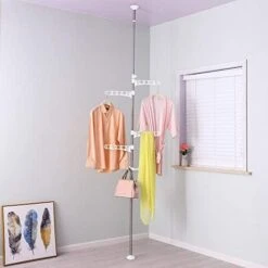 BAOYOUNI 4-Tier Standing Clothes Laundry Drying Rack Coat Hanger Organizer Floor To Ceiling Adjustable Metal Corner Tension Pole, Grey -GENERIC Shop 41fcsrC0qFL. AC