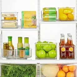 MDesign Plastic Kitchen Pantry Cabinet, Refrigerator Or Freezer Food Storage Bins With Handles - Organizer For Fruit, Yogurt, Snacks, Pasta - Food Safe, BPA Free, 10” Long - 4 Pack, Clear -GENERIC Shop 51SzeBKqhTL